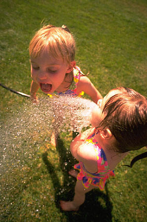 ABC Water Softeners Image of Kids playing in soft water.